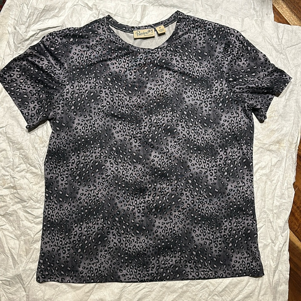 Grey spotted print. Microfiber and spandex.